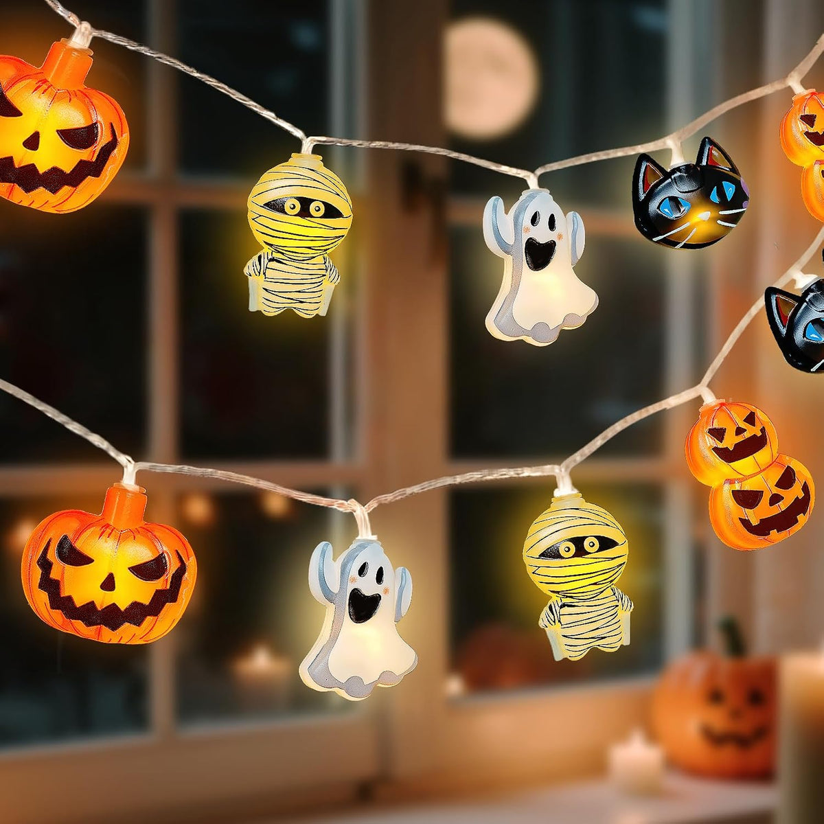 20 led bulbs on a 9.84 ft string shaped as pumpkins, stacked pumpkins, ghosts, mummies, and cats