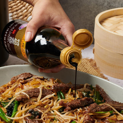 Lee Kum Kee Premium Dark Soy Sauce – Sodium-Smart Asian Cooking Companion for Balanced Weeknight Dinners, Rich Color from a Single Spoon
