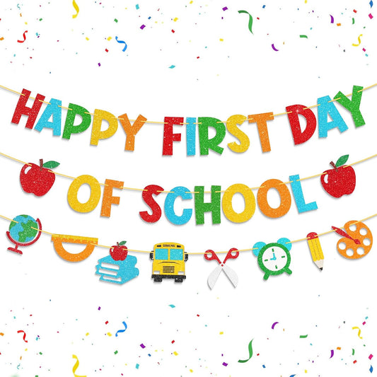 three pre-strung banner pieces: 'happy first day', 'of school', and a symbol banner with apples, pencils, books, and buses